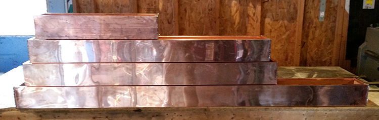 Custom-sized copper-clad window boxes.